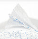 Papel Rolo Multiusos Amoos Strong 70M mostrando a textura suave e absorvente das folhas.