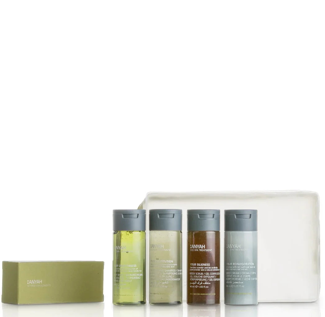 Kit de Amenities Anyah Essentials (6pcs) com produtos de higiene em tamanhos de viagem e embalagem ecológica.