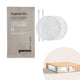 Kit de Higiene Descartável da Grammo, embalado em papel reciclável com cotonetes e discos de limpeza.