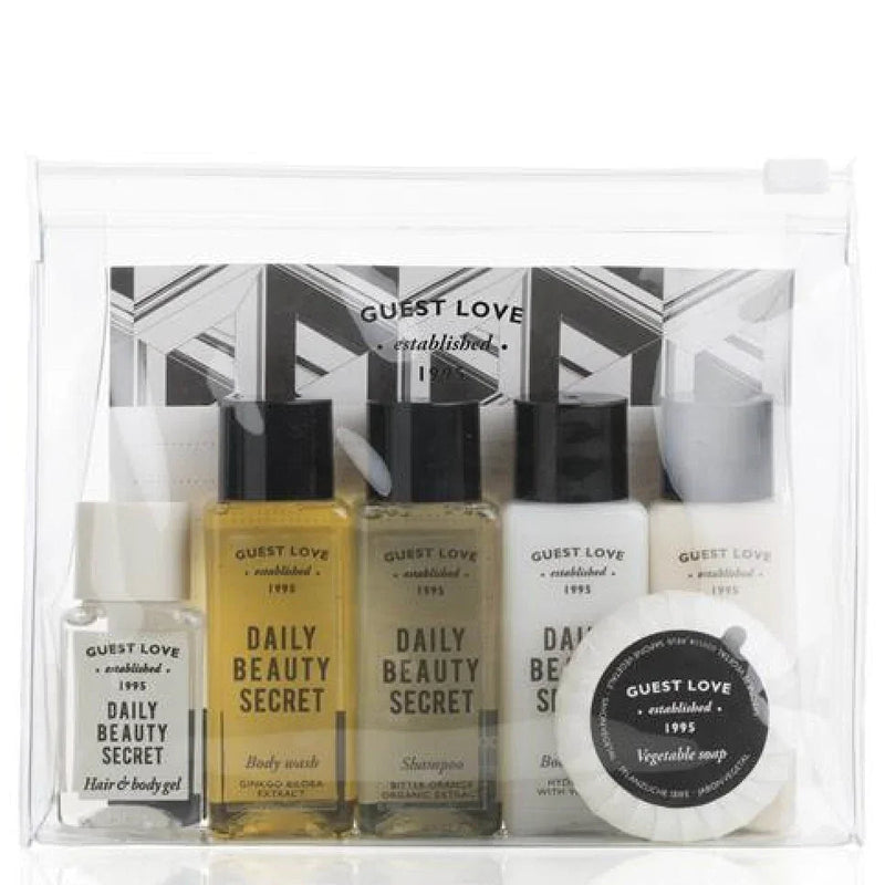 Kit de Amenities Guest Love Essentials (7pcs) com produtos de higiene em tamanho viagem.