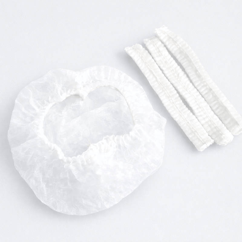 Toucas Clip Brancas Descartáveis com elásticos, pack de 100 unidades, ideal para ambientes limpos e segurança.