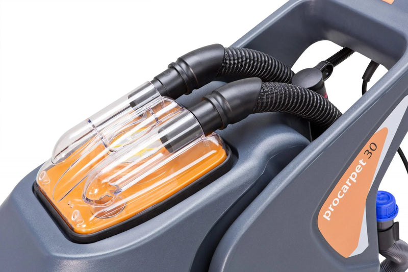 Lavadora Alcatifas Injeção e Extração Profissional TASKI com tubos de extração e injeção visíveis.